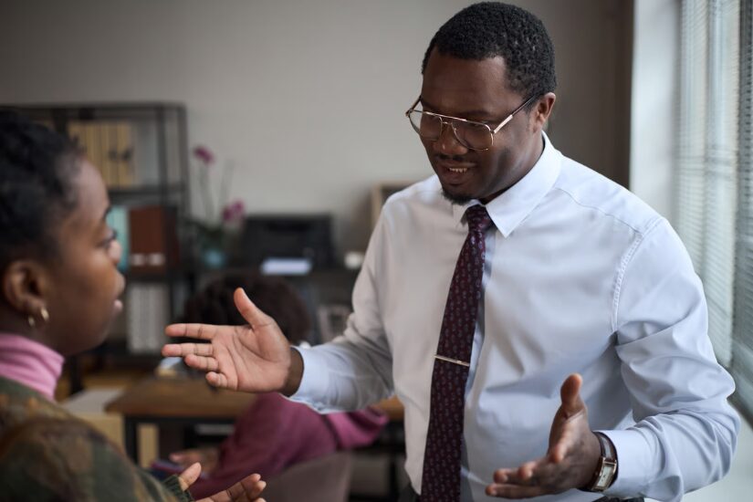 Assistant Principal talking to student in office